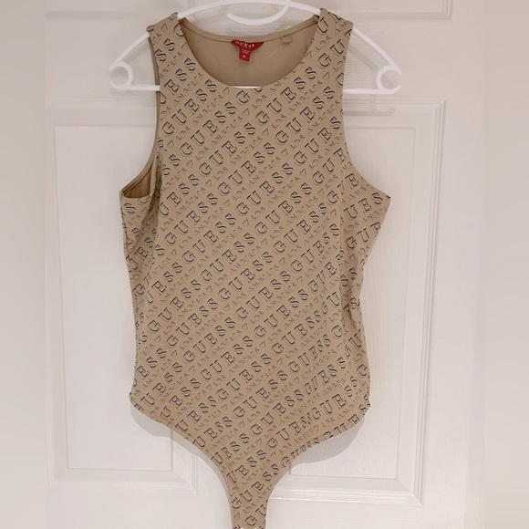 Other - ♥️Guess Bodysuit for women bottom closure.
size 14/XL NEW pit to pit 17 1/2”